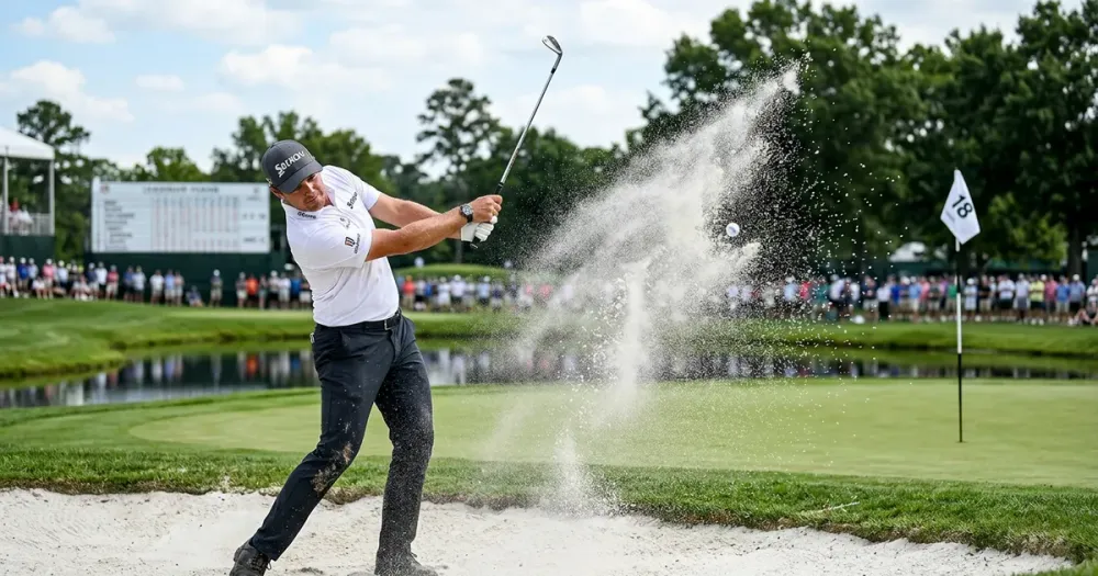 Tiger Woods speaking at a press event, sharing an update on his PGA Tour return amid recovery from injury.